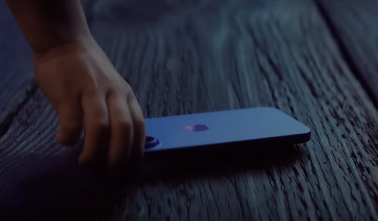 iPhone 16 dropped on wooden platform